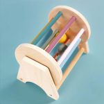 Montessori wooden scorlling drum